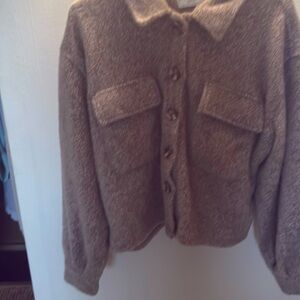 Barn style jacket soft and fuzzy. Very warm and cozy.